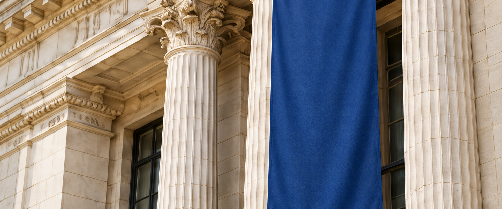 Architectural columns with a plain navy banner